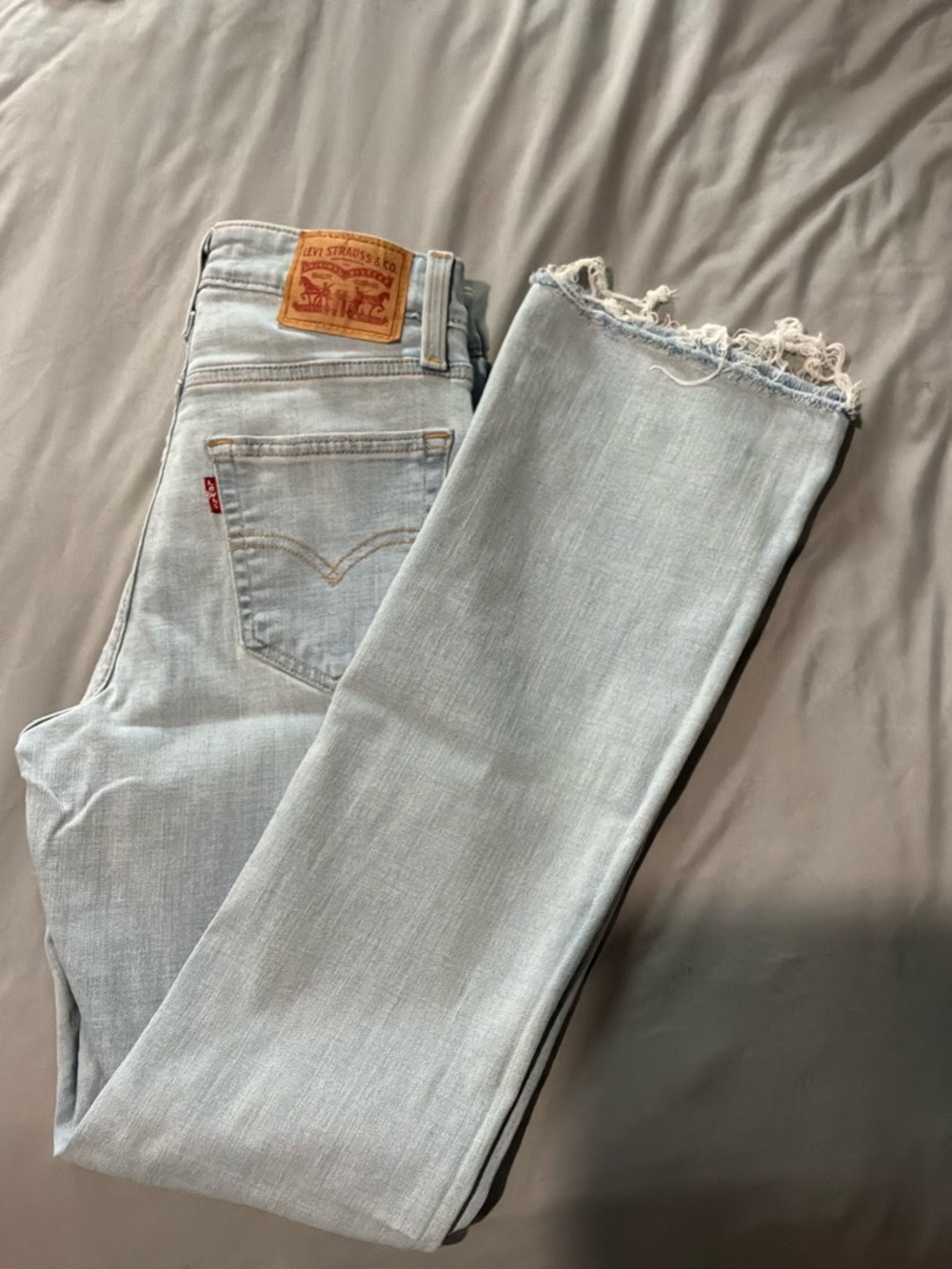 Levi's Light Blue Frayed Ankle Jeans